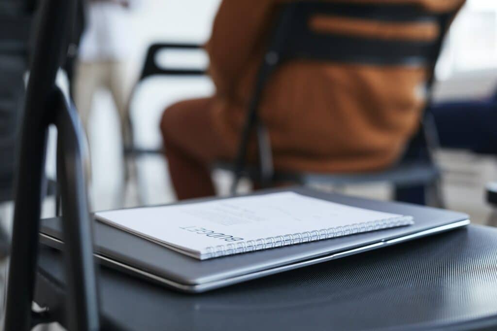 Close Up of Notebook at Conference